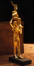 Goddess Menkeret lifts the mummified King Tutankhamun up to heaven in the afterlife