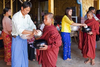 Rice feeding at the inauguration ceremony of A Lo Taw Pauk Pagoda