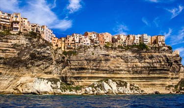 Steep coast of Bonifacio with old town on a limestone plateau