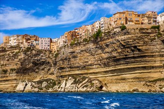 Steep coast of Bonifacio with old town on a limestone plateau