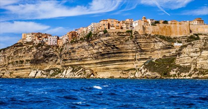 Steep coast of Bonifacio with old town on a limestone plateau