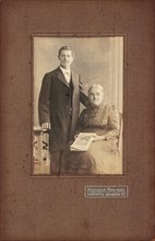 Historical photo of elderly couple around 1920