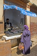 Fish seller in the souk