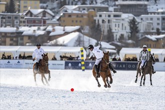 Valentin Novillo Astrada of Team Maserati swings the stick at full gallop for the stroke 36th Snow Polo World Cup St. Moritz 2020