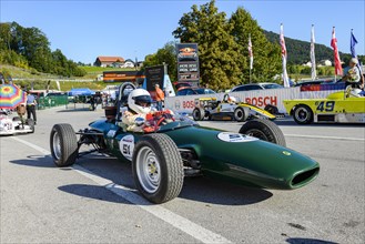 Historic race cars in waiting position