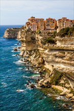 Steep coast of Bonifacio with old town on a limestone plateau