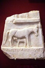 Clay tablet of a horse-boy