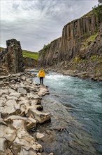 Tourist at Stuolagil Canyon