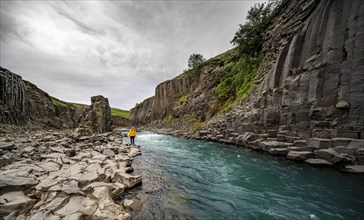 Tourist at Stuolagil Canyon