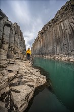 Tourist at Stuolagil Canyon