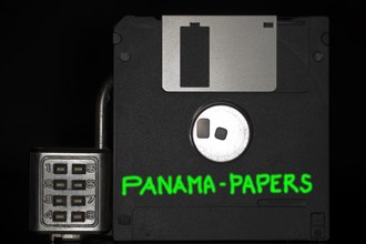 Floppy disc with combination lock with the green inscription Panama Papers