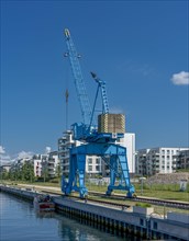 Old cargo crane in the new development area at Schwerin Lake