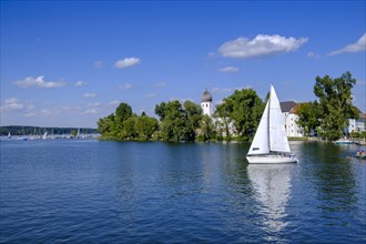 Sailing boats in front of Fraueninsel with Frauenwoerth Monastery