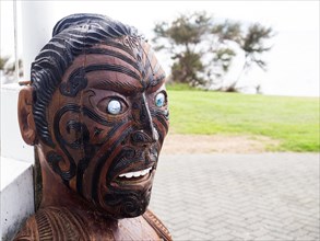 Wooden figure at the Maori meeting house in Ohinemutu