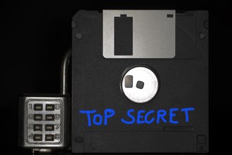 Floppy disc with combination lock with the blue inscription Top Secret