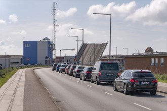Waiting cars in front of the bascule bridge at the harbour of Hvide Sande