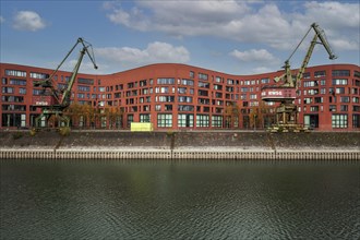 New building of the State Archive of North Rhine-Westphalia with old harbour cranes