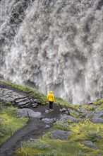 Woman standing in front of gorge