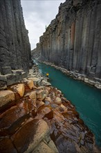 Tourist at Stuolagil Canyon