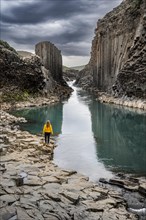 Tourist at Stuolagil Canyon