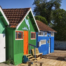 Colourful oyster farmers' huts
