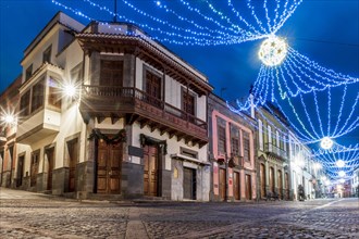 Illuminated main street in historic Teror