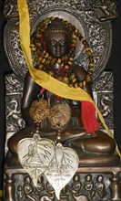 Decorated bronze Buddha statue