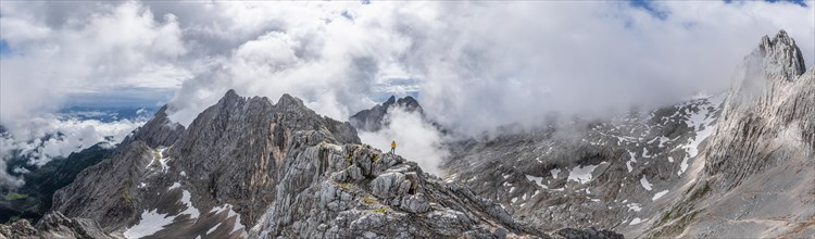 Hiker at the summit of the Westliche Toerlspitze