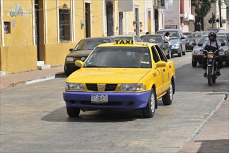 Taxi on the road at Plaza Mayor