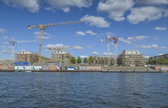 Waterkant development area with construction cranes