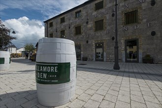 Wiskhy cask in front of Tullamore Distillery