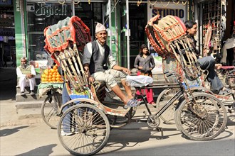 Rickshaw driver waiting for passengers