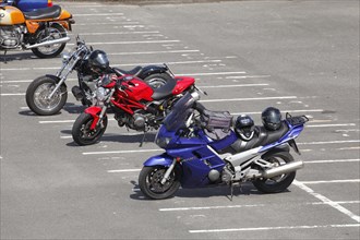Motorbikes in a car park