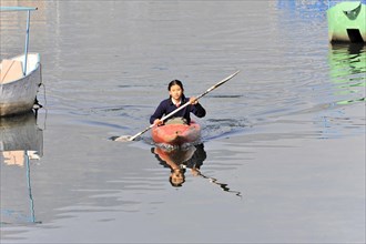 Girl with paddle boat