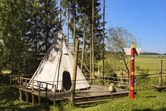 Indian tent in the forest ropes course