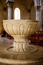 Baptismal font of the Cathedral of San Valentino