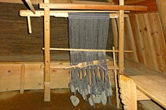 Loom in the historic longhouse Pjodveldisbaer