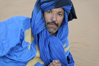 Portrait of a Tuareg with turban in Erg Chebbi