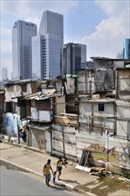 Paraisópolis favela in front of modern skyscrapers, contrast, Morumbi district, Sao Paulo