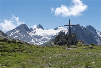 Nufenen Cross in Alpine Landscape near Nufenen Pass