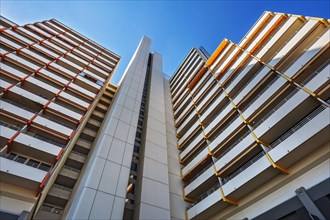 High-rise building with concrete balconies