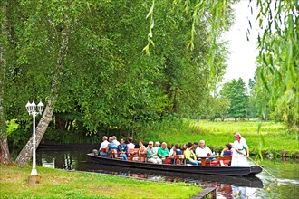 Tourists in a typical barge in the Spreewald