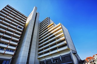 High-rise building with concrete balconies