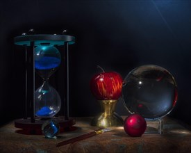 Still life with hourglass