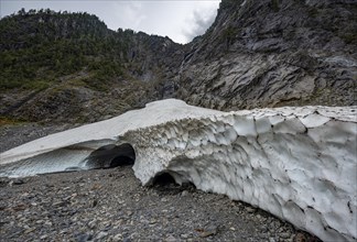 Entrance of an ice cave of a glacier