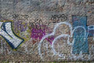 Wall at the southern cemetery with graffiti
