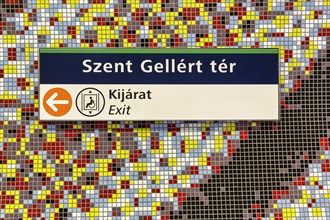 Sign with lettering Szent Gellert ter on colourful wall with mosaic