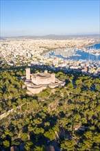 Castell de Bellver castle with harbour holiday travel aerial view in Palma de Majorca