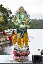Statue of Lord Ganesh at the sacred lake of Ganga Talao in the south of the island of Mauritius