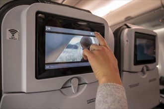 Hand operates computer screen